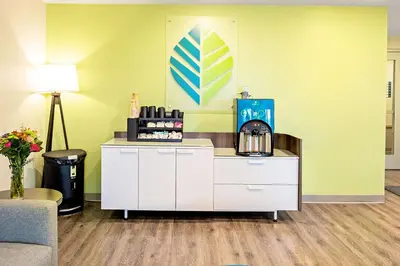 a coffee shop with a coffee maker on a counter at WoodSpring Suites Reno Sparks in Sparks