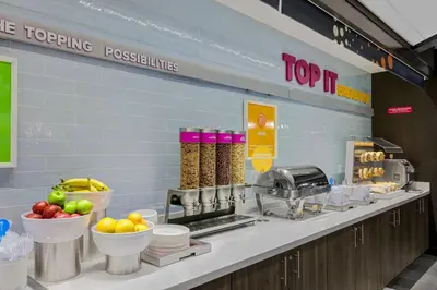 a counter with aasteryasteryasteryasteryasteryasteryasteryasteryasteryasteryasteryastery at Tru By Hilton Lathrop in Lathrop