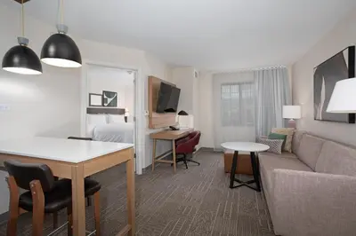 a living room with a couch and a table at Staybridge Suites - Carson City - Tahoe Area by IHG in Carson City