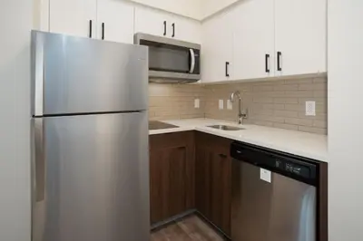 a kitchen with a stainless steel refrigerator and a sink at Staybridge Suites - Carson City - Tahoe Area by IHG in Carson City