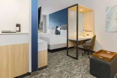 a hotel room with a bed and a desk at SpringHill Suites by Marriott Truckee Lake Tahoe in Truckee