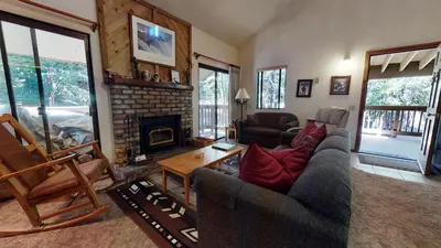 a living room with a couch and a fireplace at Hidden Valley #104 condo in Mammoth Lakes