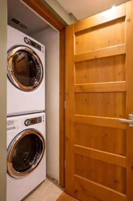 a laundry room with a washer and dryer at Cedar Crest - Mallard Cottage 5 in Homewood