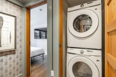 a laundry room with a washer and dryer at Cedar Crest-Stellars Jay Cottage 4 in Homewood