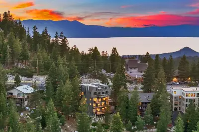 an aerial view of a building in the trees at LUXE 11 Blue Diamond Lodge Lake Tahoe in Stateline