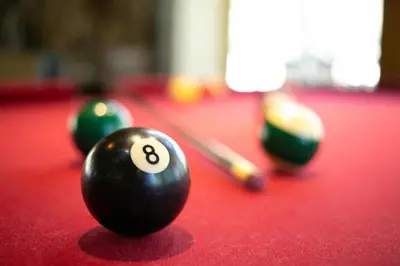 a ball on a pool table at Beautiful Remodeled One Bedroom Condo! in Mammoth Lakes