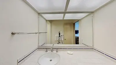 a bathroom with a toilet in the middle of a room at Updated 2 Bdrm Condo with Shared Hot Tub in Mammoth Lakes