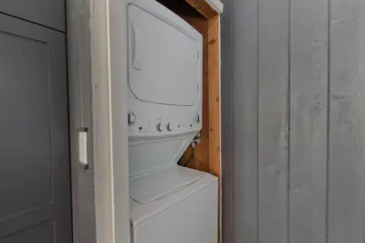 a white washer and dryer in a room at Villa de los Pinos 42 in Mammoth Lakes