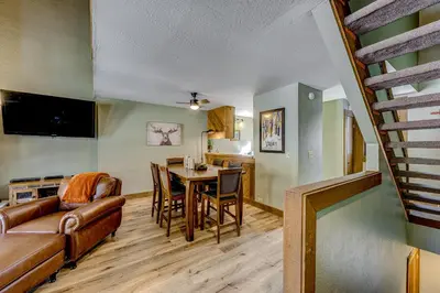 a living room with a couch and a table at Enjoyable Northstar Condo in Kingswood Estates