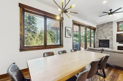 a dining room with a wooden table and chairs at Truckee Treat in Truckee