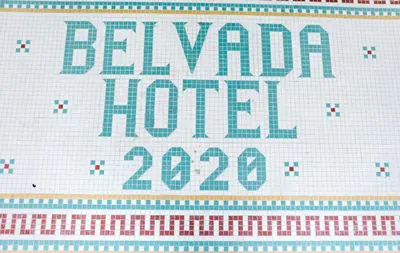 a sign with the words baylor norfolk on it at Belvada Hotel in Tonopah
