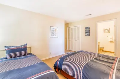 a bedroom with two beds in a room at Homewood Bliss in Homewood