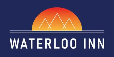 a logo for waterloo inc with a sunset at Waterloo Inn in Stockton
