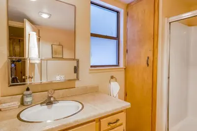 a bathroom with a sink and a mirror at Eska's Escape in Soda Springs