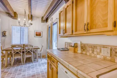 a kitchen and dining room with a table and chairs at Eska's Escape in Soda Springs