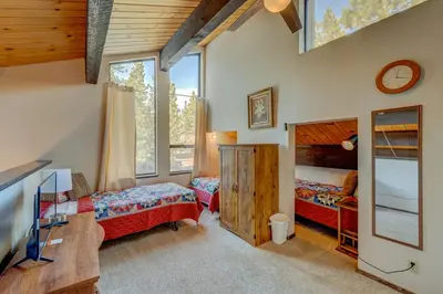 a bedroom with two beds and a tv in it at Kings Beach Bliss in Kings Beach