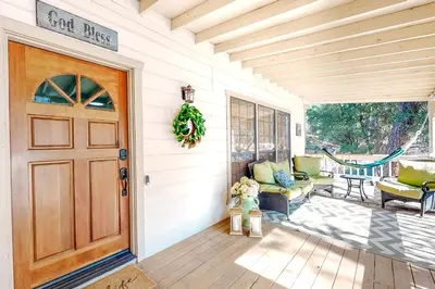 a front door of a house with a porch at Summer Creek in Groveland