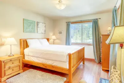 a bedroom with a bed and a window at Sugar House in Soda Springs