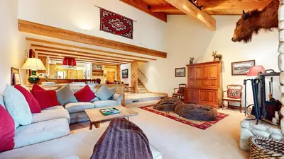 a living room with a couch and a table at Val D'Isere #9 condo in Mammoth Lakes