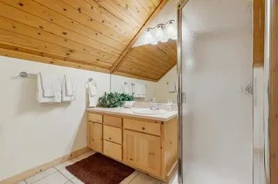 a bathroom with a shower and a sink at Boat House in Soda Springs