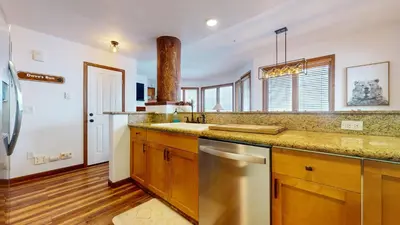 a kitchen with a sink and a counter top at Eagle Run #103 condo in Mammoth Lakes