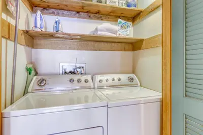 a washer and dryer in a tiny house at Northstar Perch in Truckee