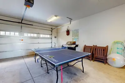 a ping pong table in a room with a ping pong ball at Fabian Holidays in Tahoe City