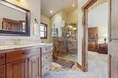 a bathroom with a shower and a sink at Fabian Holidays in Tahoe City