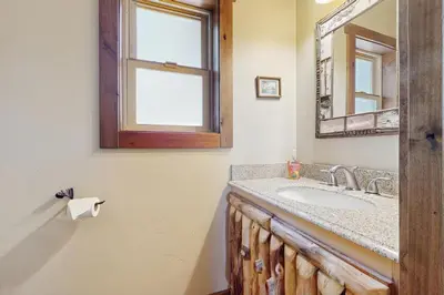 a bathroom with a sink and a mirror at Fabian Holidays in Tahoe City