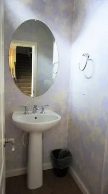 a bathroom with a sink and a mirror at Modern Luxury Living, relax and enjoy your stay! in Rancho Cordova