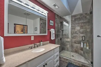 a bathroom with a sink and a shower at Near Hiking Trails Cabin with Deck in Pioneer! in Pioneer