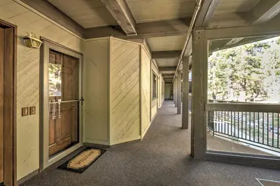 an empty hallway of a house with a door at Walk to Ski Shuttle Incline Village Condo in Incline Village