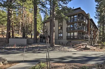 a house in the woods with trees at Walk to Ski Shuttle Incline Village Condo in Incline Village