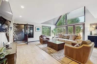 a living room with a couch and a table at Meadowview in Truckee
