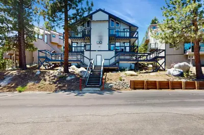 a large building with stairs in front of it at Heavenly Hideaway in Stateline