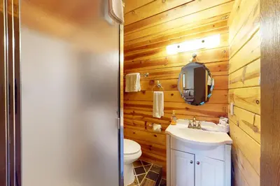 a bathroom with a toilet and a sink at Ridgeline Panorama in Truckee