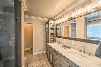 a bathroom with a sink and a mirror at 4 Mi to Dtwn Truckee Tahoe Donner Home with Hot Tub in Truckee
