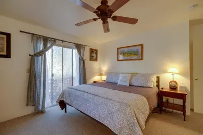 a bedroom with a bed and a ceiling fan at Secluded Mountain Hideaway Less Than 8 Miles to Bass Lake! in North Fork