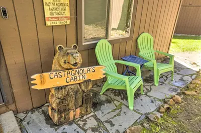 a couple of chairs and a bear sign on a house at 3 Mi to Lake Tahoe Quiet Incline Village Cabin! in Incline Village