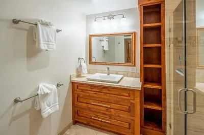 a bathroom with a sink and a shower at 4 Mi to Diamond Peak Ski Resort Gem with Hot Tub in Incline Village
