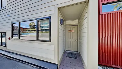 a building with a door and windows on it at 1849 Condos 511 condo in Mammoth Lakes