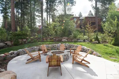 a patio with chairs and a fire pit in a yard at Hyatt Vacation Club at High Sierra Lodge in Incline Village