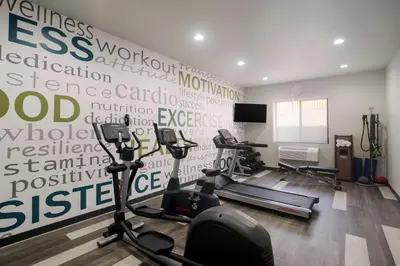 a gym with two exercise bikes in a room at Best Western Colfax in Colfax