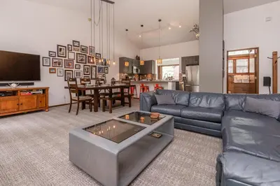 a living room with a couch and a table at Helios 11N in Mammoth Lakes