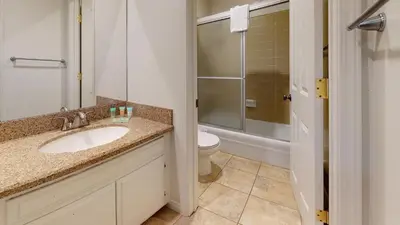 a bathroom with a sink and a toilet at Mammoth Estates 3 Bdrm Condos - Walking Distance to The Village Gondola Station in Mammoth Lakes