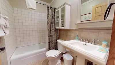a bathroom with a sink and a toilet and a tub at Mammoth Estates 4 Bedroom Condos - Great for Families! in Mammoth Lakes