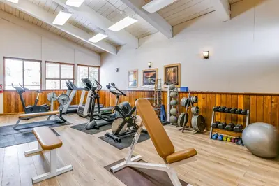 a gym with treadmills ellipticals and exercise equipment at Unit 18A at Granlibakken in Tahoe City