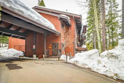 a building with snow in front of it at Unit 18A at Granlibakken in Tahoe City