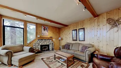 a living room with two couches and a fireplace at 2 Bedroom Townhome With Easy Access to Mountain Biking & Lake Activities - Unit 531 at 1849 condo in Mammoth Lakes