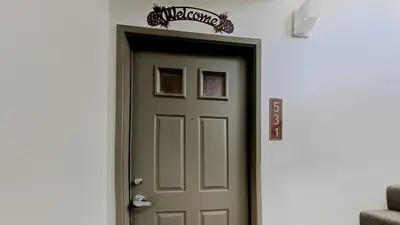 a door in a room with a sign above it at 2 Bedroom Townhome With Easy Access to Mountain Biking & Lake Activities - Unit 531 at 1849 condo in Mammoth Lakes